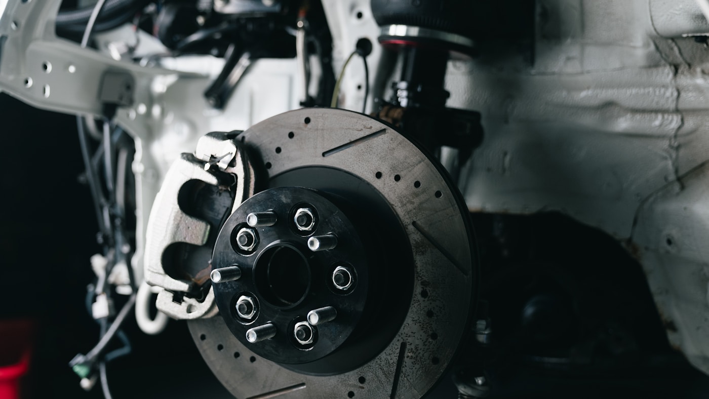 Brake disc rotor and caliper assembly during brake repair service